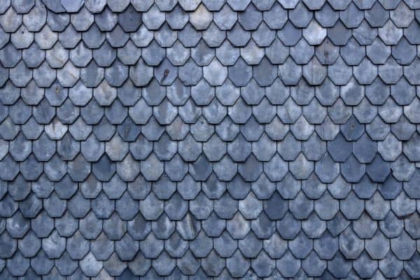 Aged slate roof tiles close-up